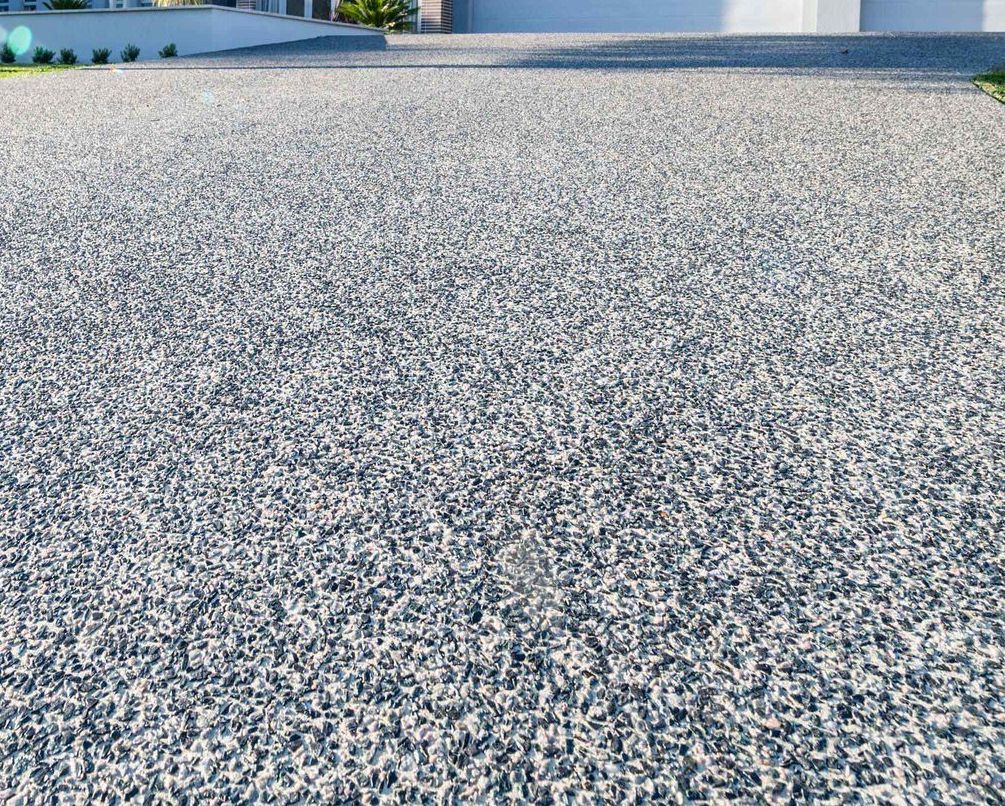 newly installed exposed aggregate driveway in East Valley, AZ