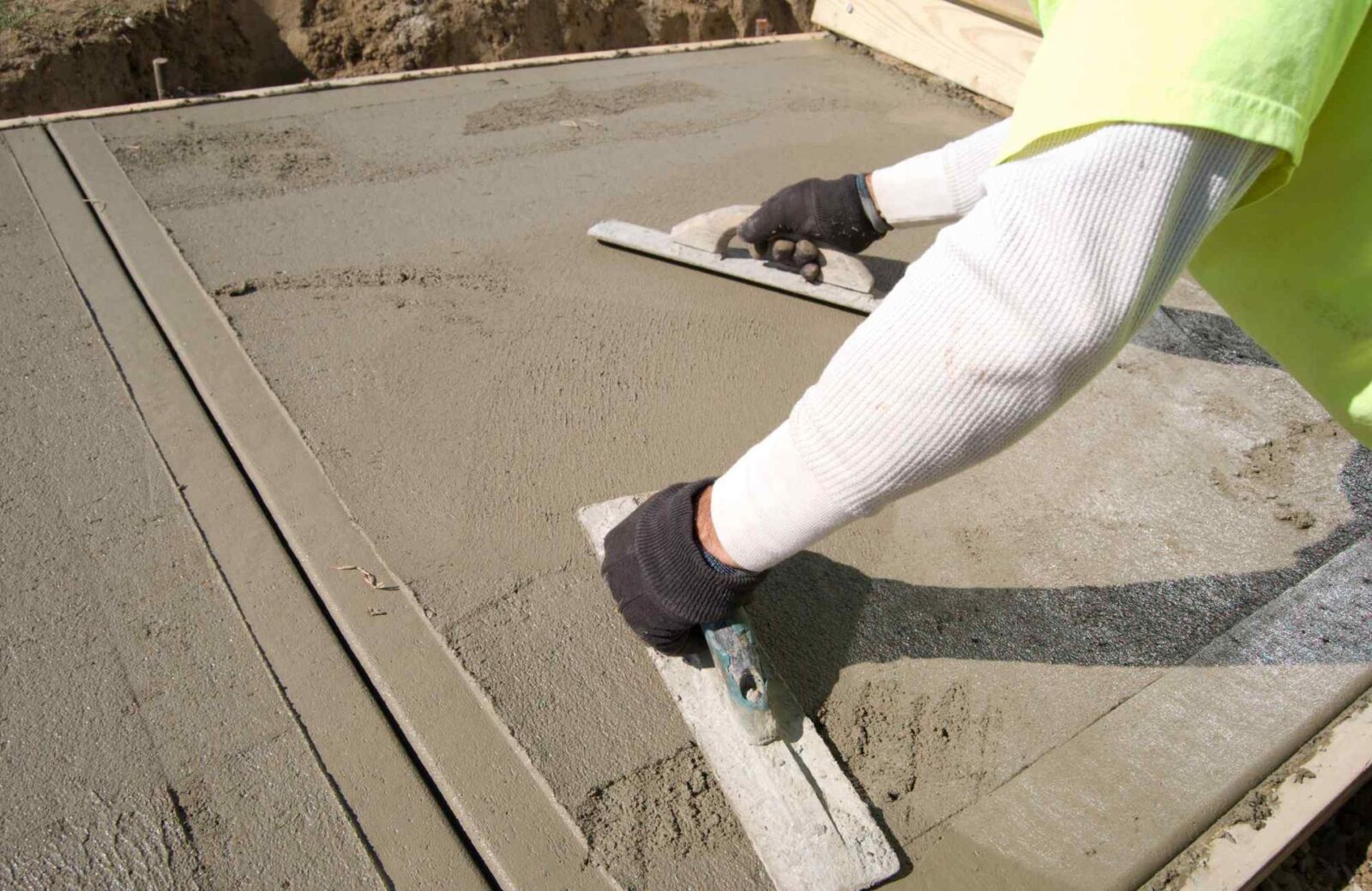 trowels are used to create a smooth-finished walkway in Scottsdale, AZ